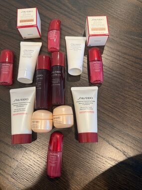 Shiseido Skincare Set with White Tubes and Red Bottles
